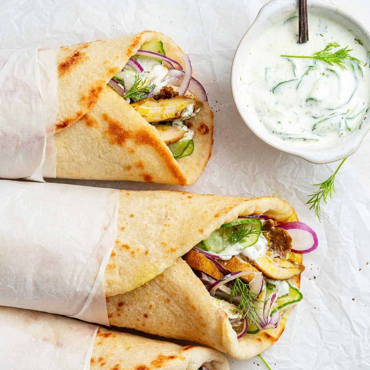 Hot dogs (loaded with sauces, veggies, cheese)